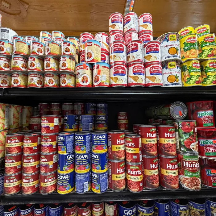 Canned milk, tomato sauce, and pantry essentials