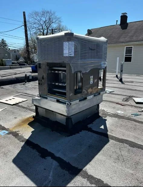 New commercial rooftop HVAC unit installation