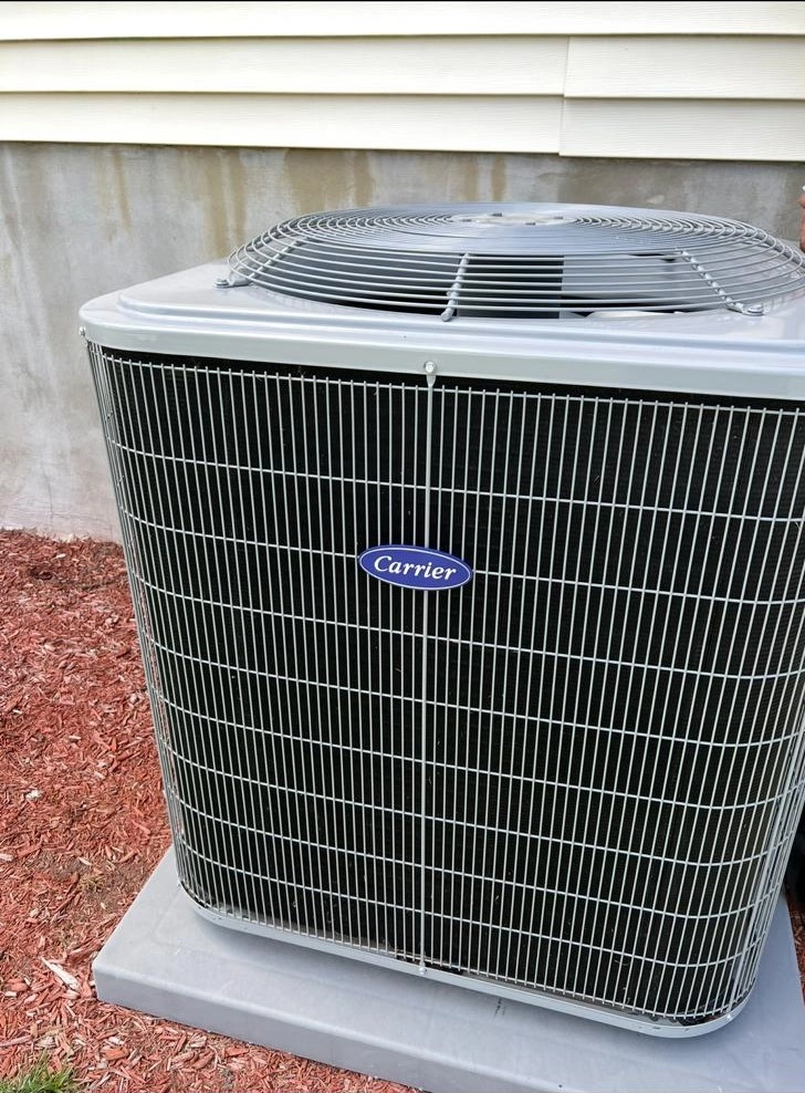 Carrier residential AC condenser installation