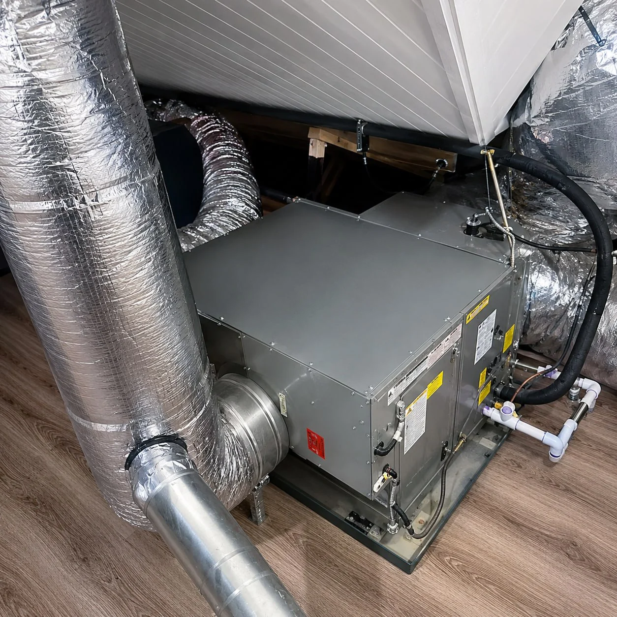 Residential attic furnace and air handler with insulated ductwork